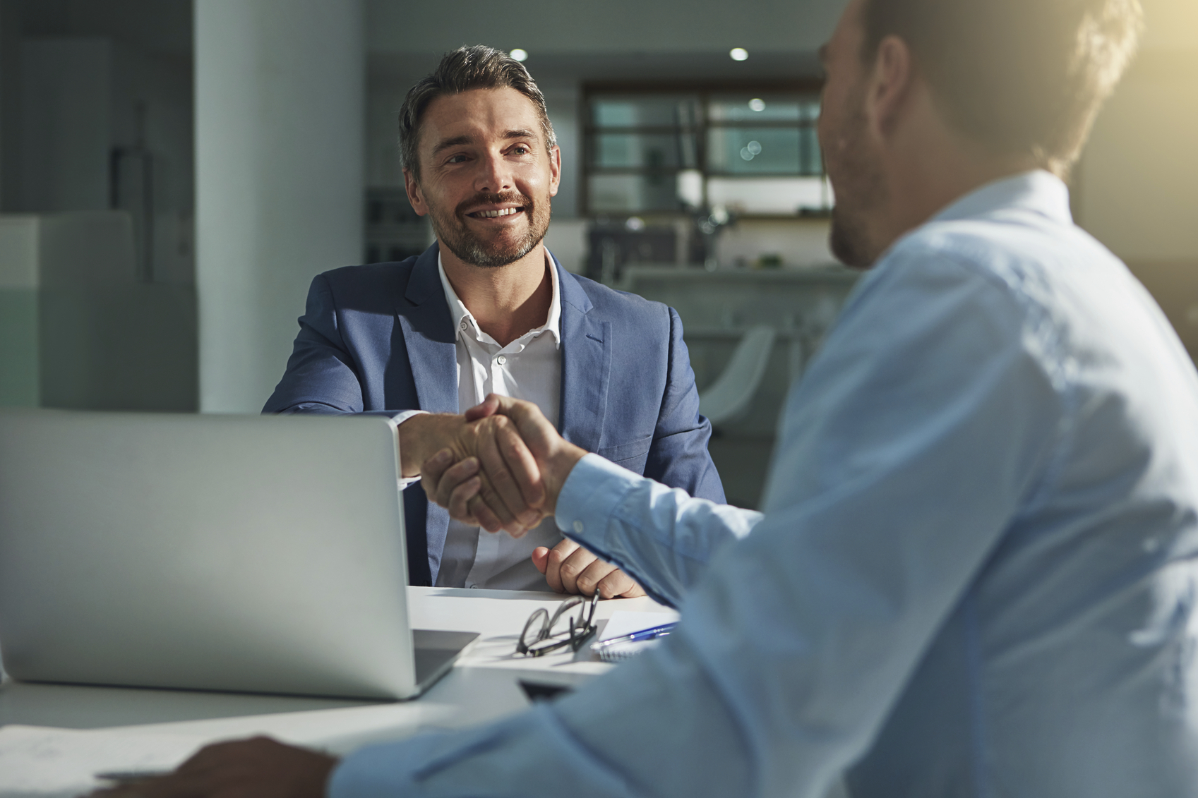 Business men shaking hands 